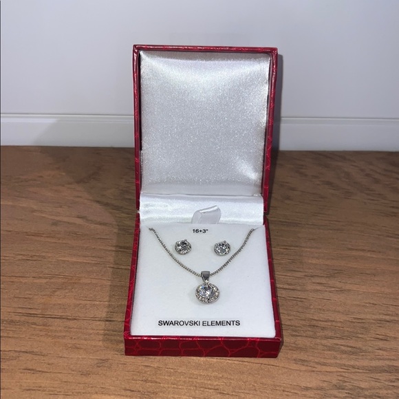 Swarovski Jewelry - NWOT - Swarovski Silver Necklace and Earrings with Circular Pendant